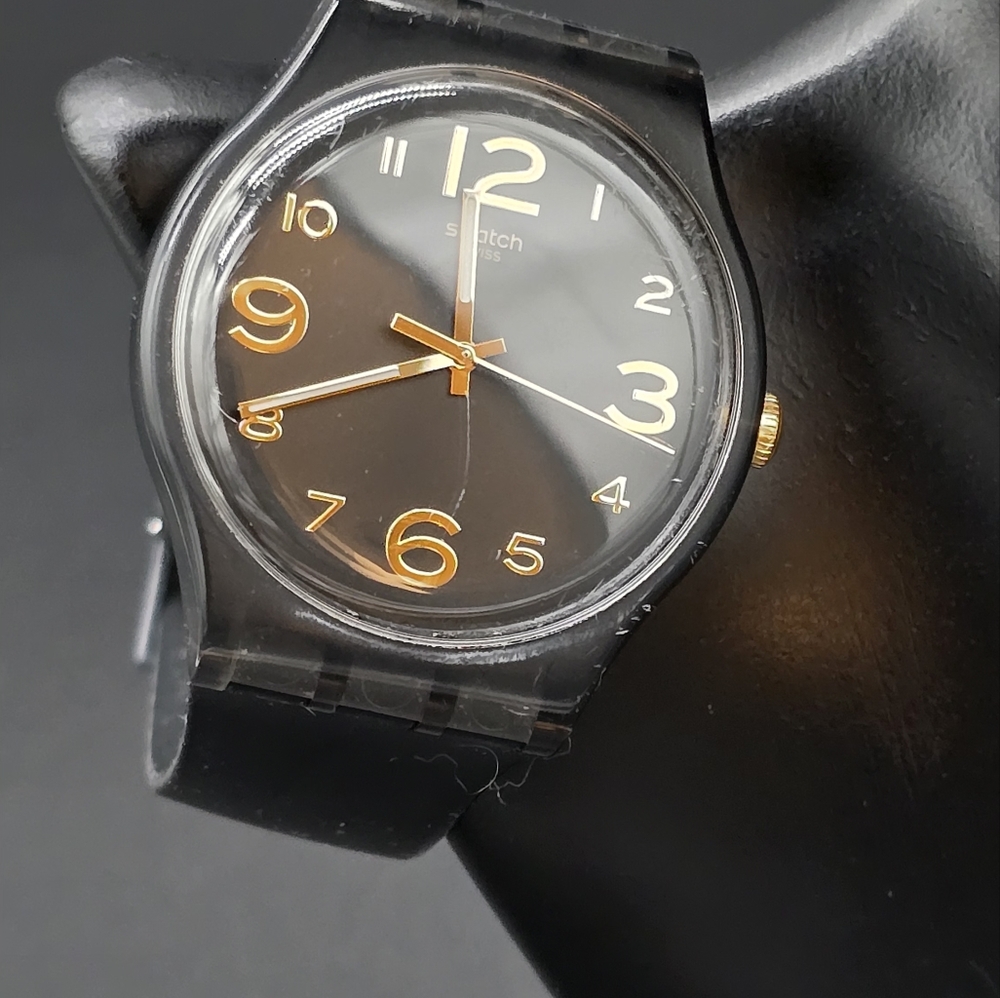 Swatch Black and Gold Watch